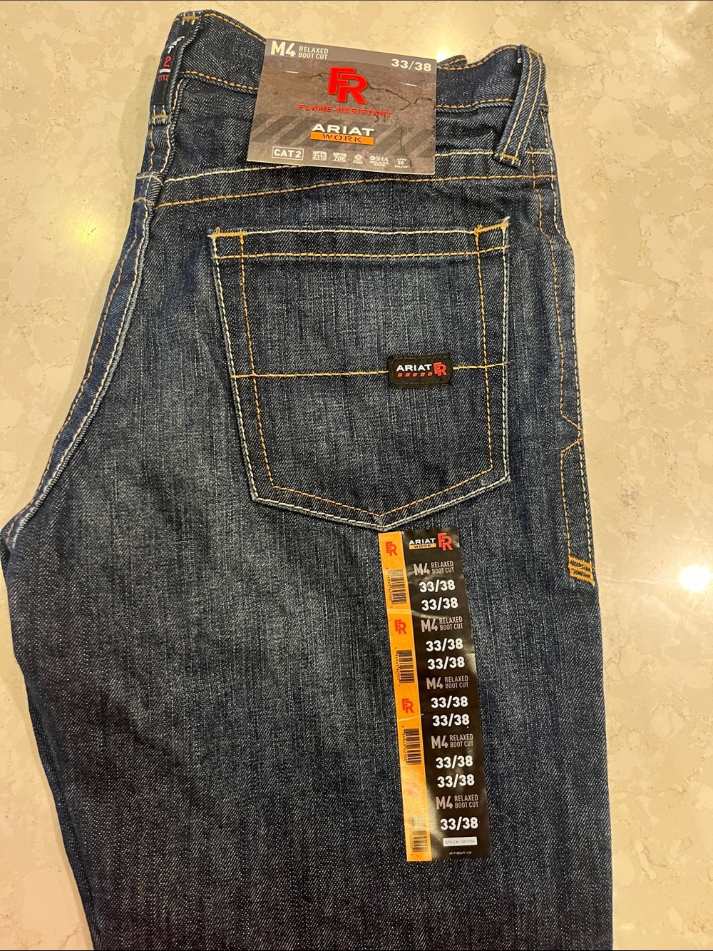FR Ariat Men's Relaxed Fit Jeans in Dark Blue with Gold Stitching